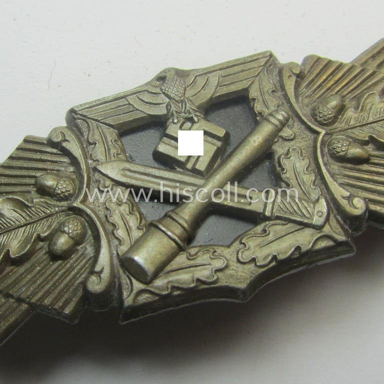 'Nahkampfspange in Bronze' (or: bronze-class close-combat clasp ie. CCC) being a maker- (ie. 'F.&B.-L.'-) marked- and/or minimally converse-shaped specimen as was produced by the maker- (ie. 'Hersteller') 'Funcke u. Brüninghaus'