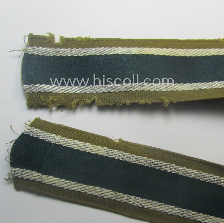Truly worn, 'BeVo'-like cuff-title (ie. 'Ärmelstreifen') entitled: 'Afrikakorps' being a with certainty issued example that comes in an overall nice- (ie. hardly shortened- and/or once tunic-attached-), condition