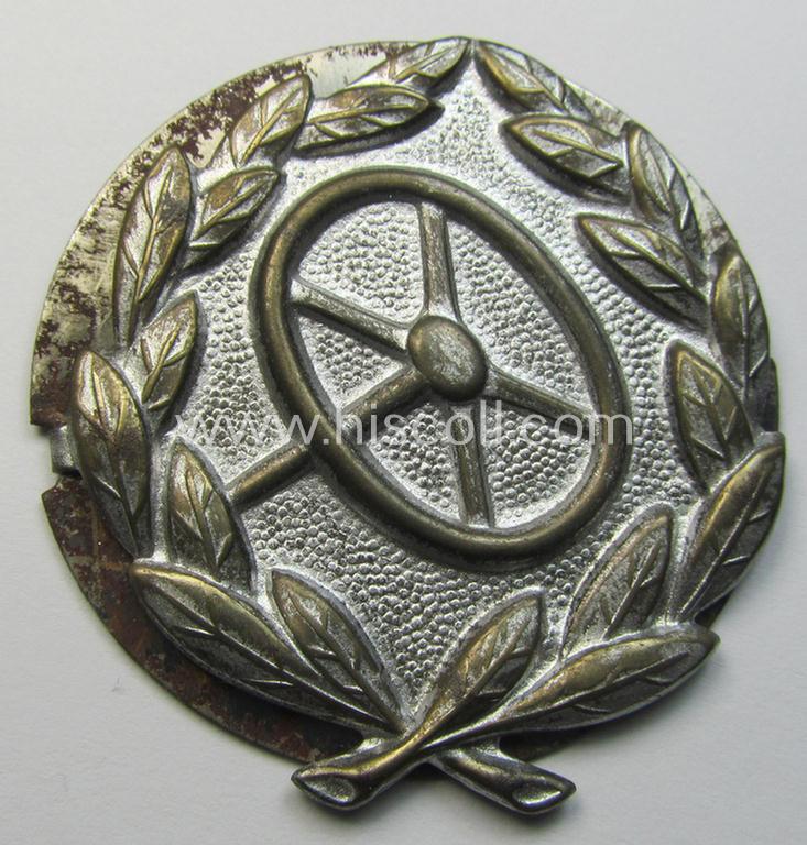 Attractive, WH (Heeres-, LW- ie. Waffen-SS-) so-called: 'Kraftfahrbewährungs-Abzeichen in Silber' being a 'virtually mint' example as was produced by the: 'Rudolf Souval'-company and that came stored in its 'Zellstoff'-based pouch