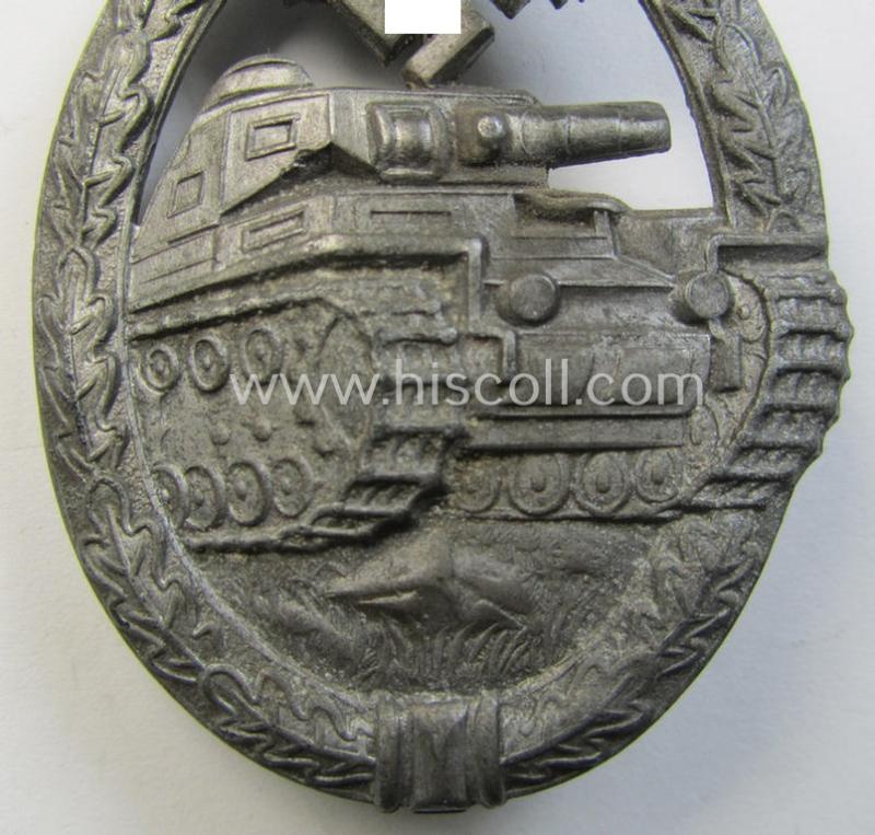 'Panzerkampfabzeichen in Silber' (or: silver-class panzer-assault badge or PAB) being a non-maker-marked- and/or hollow zinc- (ie. 'Feinzink'-) based example as was produced by the: 'Paul Meybauer'-company