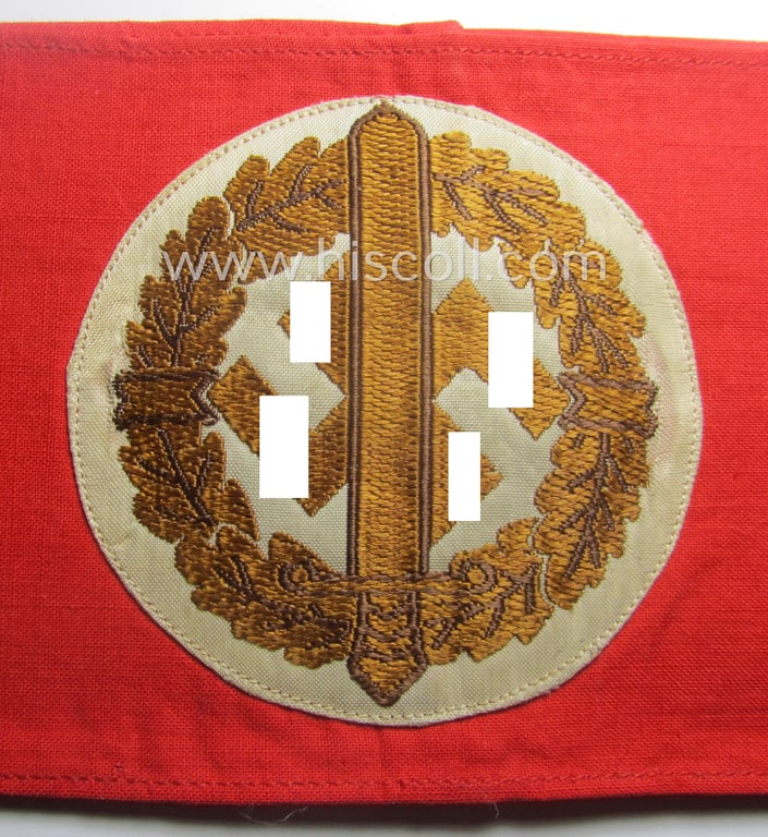 Hardly used nor worn, linnen-based armband (ie. 'Armbinde') as was intended for usage by the staff of the: 'SA-Wehrmannschaften' (being a worn example that still retains its period-attached 'RzM'-etiket)
