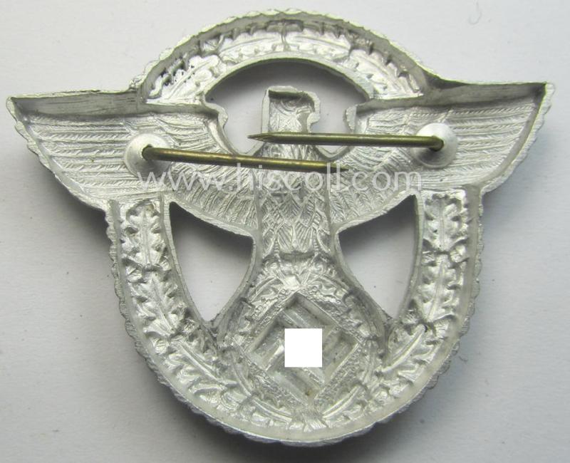 'Standard-issue'-pattern - and typical aluminium-based - 'Polizei'- (ie. police) visor-cap eagle being a bright-silver-coloured- and maker- (ie. 'G.W. 41'-) marked example as was intended for usage on the various 'Polizei' (ie. police) visor-...