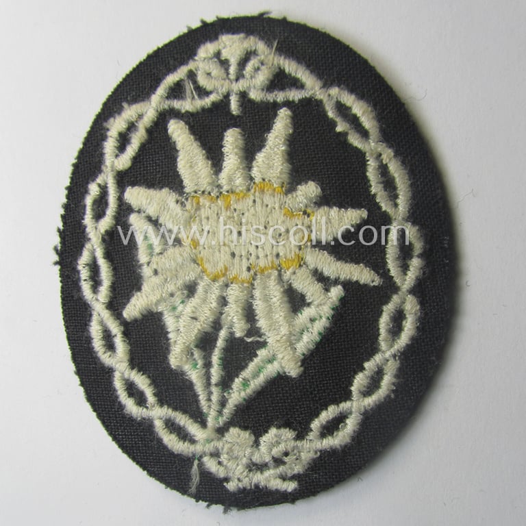 WH (Heeres) EM- (ie. NCO-) type: 'Edelweiss'-armpatch (being a typical machine-embroidered example)
