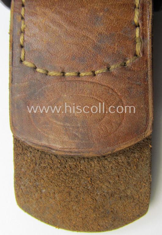 WH (Heeres) 'standard-pattern', field-grey-toned- and aluminium-based belt-buckle being a maker- (I deem 'Bernh. Haarmann'-) marked- and/or '1938'-dated example that comes mounted onto its leather-based tab
