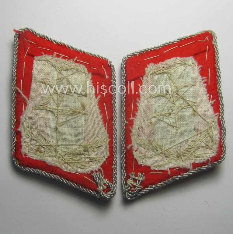 Pair of hand-embroidered WH (Luftwaffe) officers'-type collar-patches as executed in bright-red-coloured wool as was intended for usage by a: 'Hauptmann der Flak-Artillerie-Trpn.'