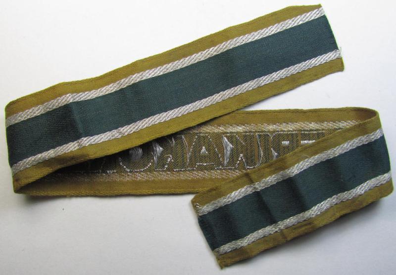 Superb, 'BeVo'-like cuff-title (ie. 'Ärmelstreifen') entitled: 'Afrikakorps' being a with certainty issued and worn example that comes in an overall nice- (ie. minimally shortened- and presumably once tunic-attached-), condition