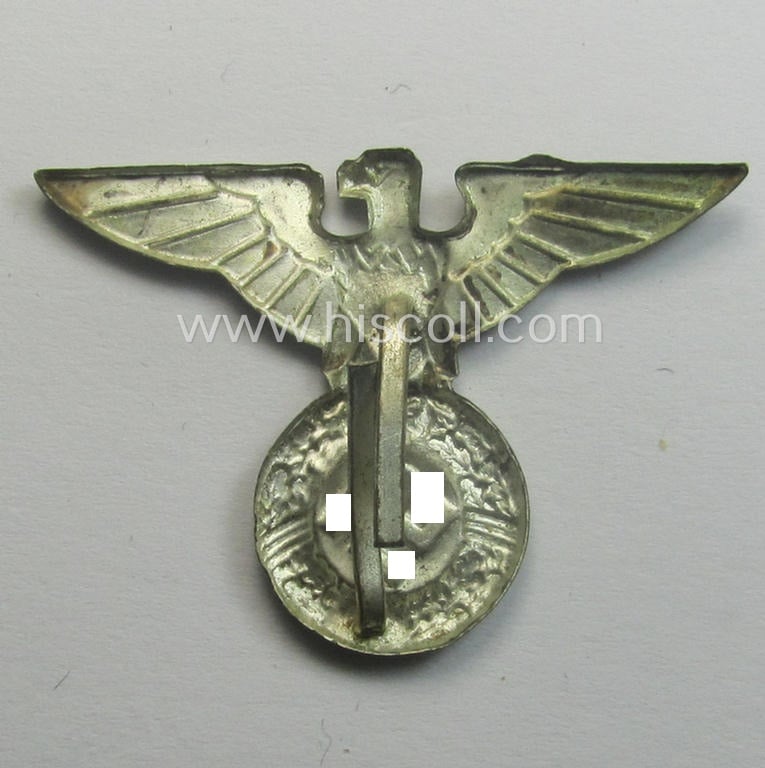 Silver-toned - and I deem 'Buntmetall'-based - early-pattern, SS- o. SA-type, political visor- (ie. 'Schirmmützen'-) cap- (ie. 'Kepi'-) eagle being a non-maker-marked example that comes in a used- ie. carefully cap-removed, condition