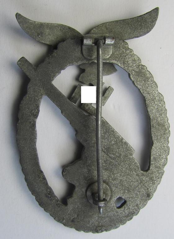 Attractive - and just moderately used! - 'Feinzink'-based example of a WH (Luftwaffe) 'Flakkampfabzeichen' (or: airforce anti-aircraft badge) being a very detailed albeit non-maker-marked example as was produced by the: 'E. Ferd. Wiedmann'-comp...