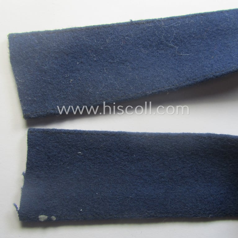 Darker-blue toned, WH (Luftwaffe) cuff-title (ie. 'Ärmelstreifen') entitled: 'Afrika' (being a full-length example that comes in an issued-, used and/or carefully tunic-removed, condition)