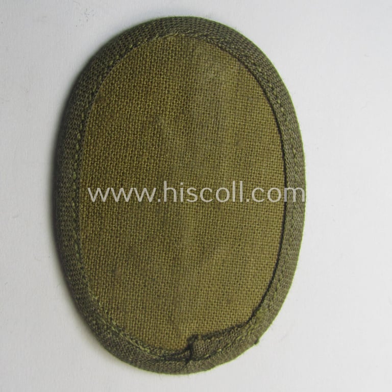 WH (Heeres) 'tropical-styled', trade- and/or special-career insignia (or: 'Signal Blitz') as was intended for a soldier who served within the: 'Artillerie-Trpn.'