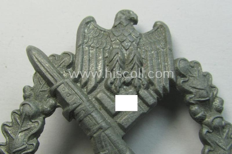 'Infanterie Sturmabzeichen in Silber', being an unmarked (and/or very converse- ie. vaulted-) 'hollow-back' example by the maker: 'Friedrich Linden' (ie. 'F.L.L.') as was executed in silver-coloured, zinc-based metal (ie. 'Feinzink')