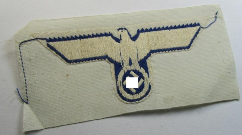 WH (KM) EM- (ie. NCO-) type breast-eagle (ie. 'Brustadler für Mannschaften u. Uffz. der Kriegsmarine') as executed in the 'BeVo'-weave-pattern on a white-coloured background as was specifically intended for usage on the various white-coloured tun...