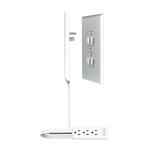 Sleek Socket cord running along baseboard