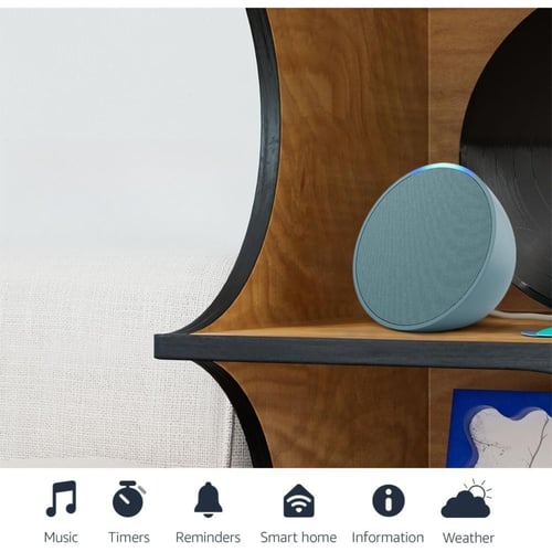 Echo Pop compact speaker fitting on a small shelf or nightstand