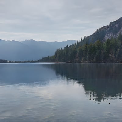 A large body of water surrounded by mountains