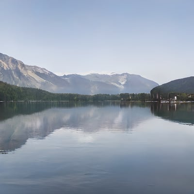 A large body of water surrounded by mountains