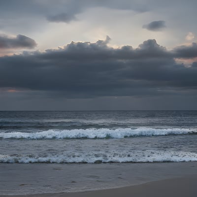 The sun is setting over the ocean waves