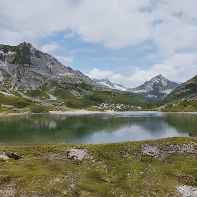 A large body of water surrounded by mountains