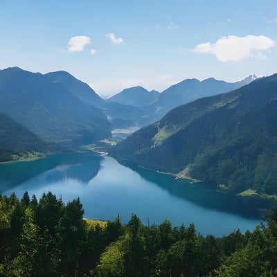 A view of a lake surrounded by mountains