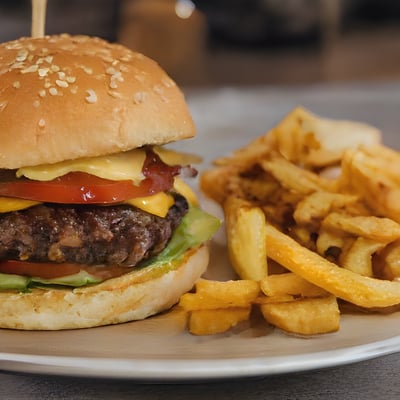 A hamburger and french fries on a plate