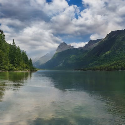 A body of water surrounded by mountains and trees