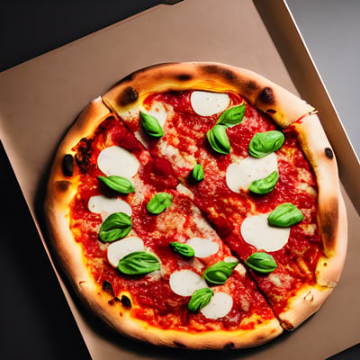 A pizza sitting in a box on top of a table