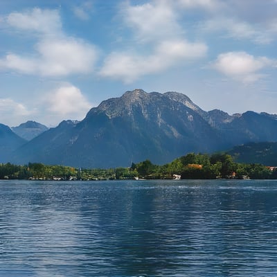 A large body of water with mountains in the background