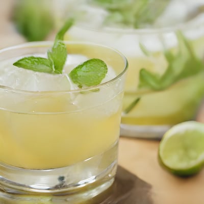 A close up of a glass of lemonade