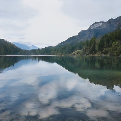 A large body of water surrounded by mountains