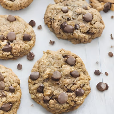 A close up of a cookie with chocolate chips