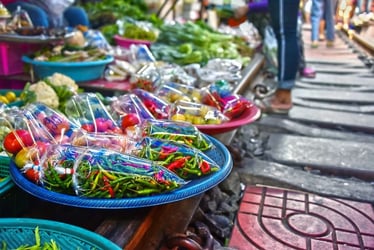 From Bangkok: Maeklong Railway Market and Damnoensaduak Floating Market with English Guide - Thai Pass