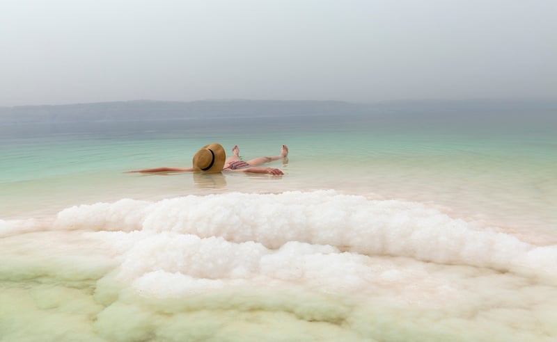 Woman Floating Dead Sea Jordan