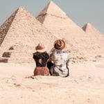 Man And Woman Visiting The Pyramids Of Giza