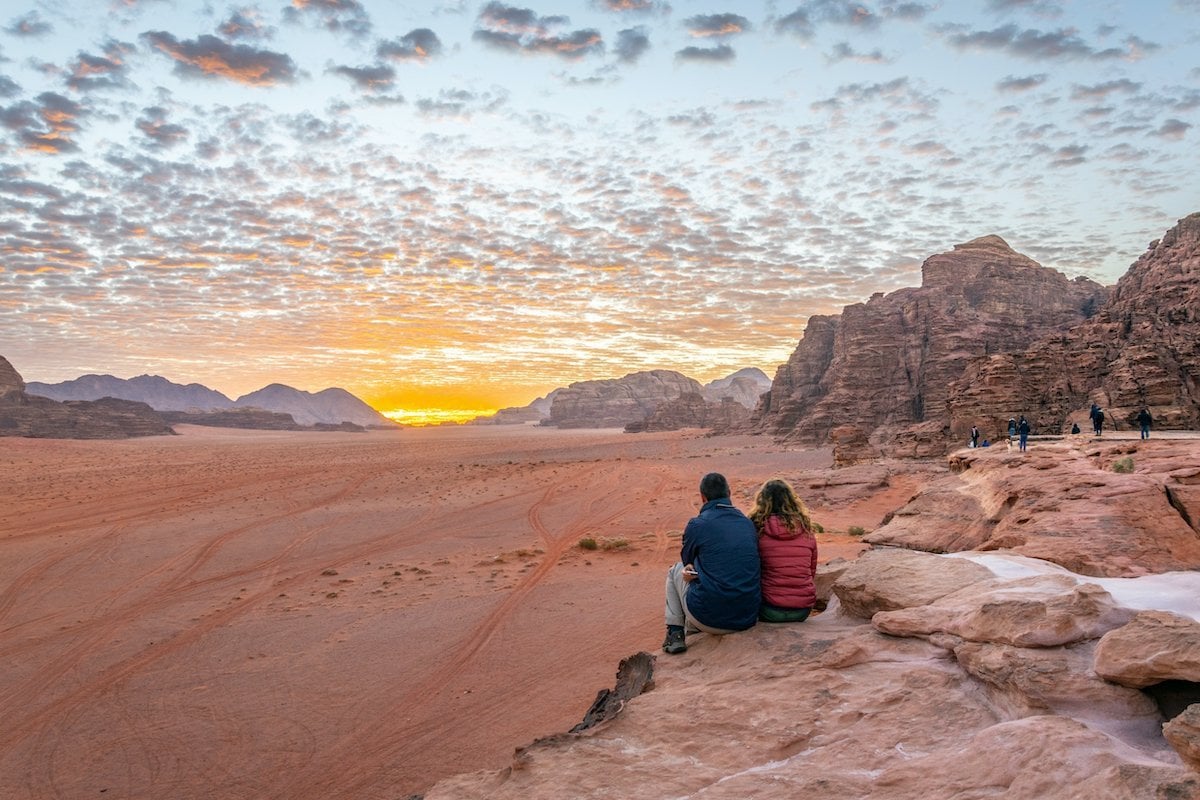 Tourists Admiring Sunset In Wadi Rum