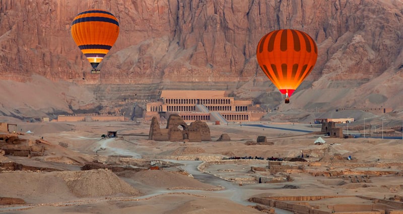 Orange Hot Air Balloons Floating Above The Temples