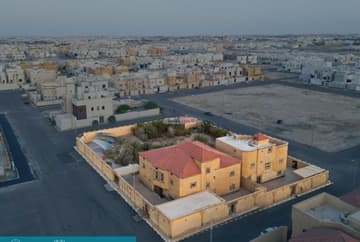 أراضي وفلل 2700م2 بحي النخيل