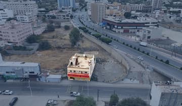عمارة سكنية تجارية 328.91م2 بحي السوق