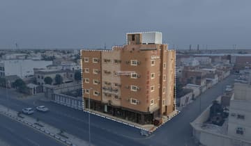 عمارة تجارية سكنية 396م2 بحي الملك عبدالعزيز