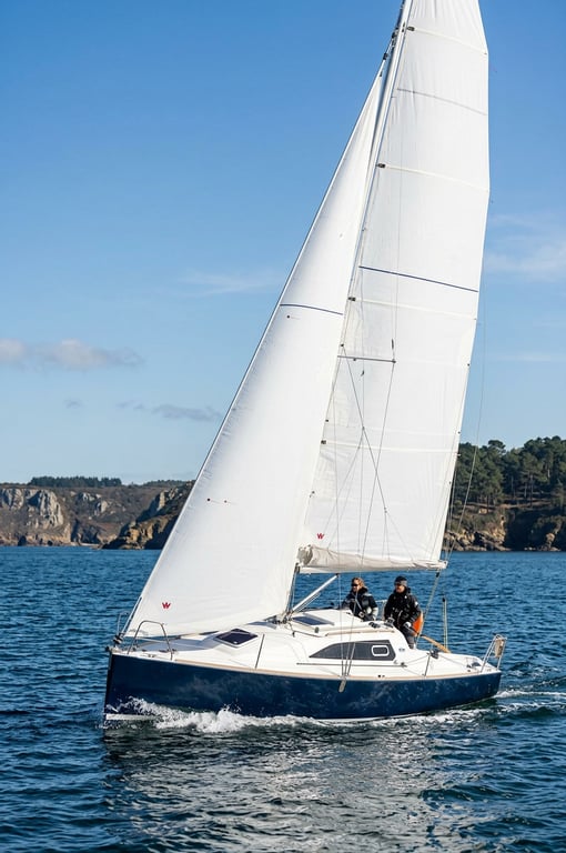 Close view of RM 800 cockpit and deck layout showing winches and traveler