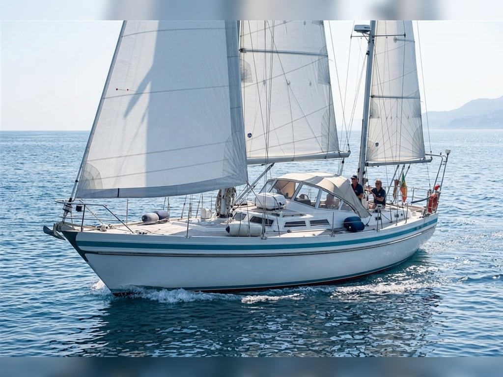 Contest 42 sailing close hauled with full main and mizzen