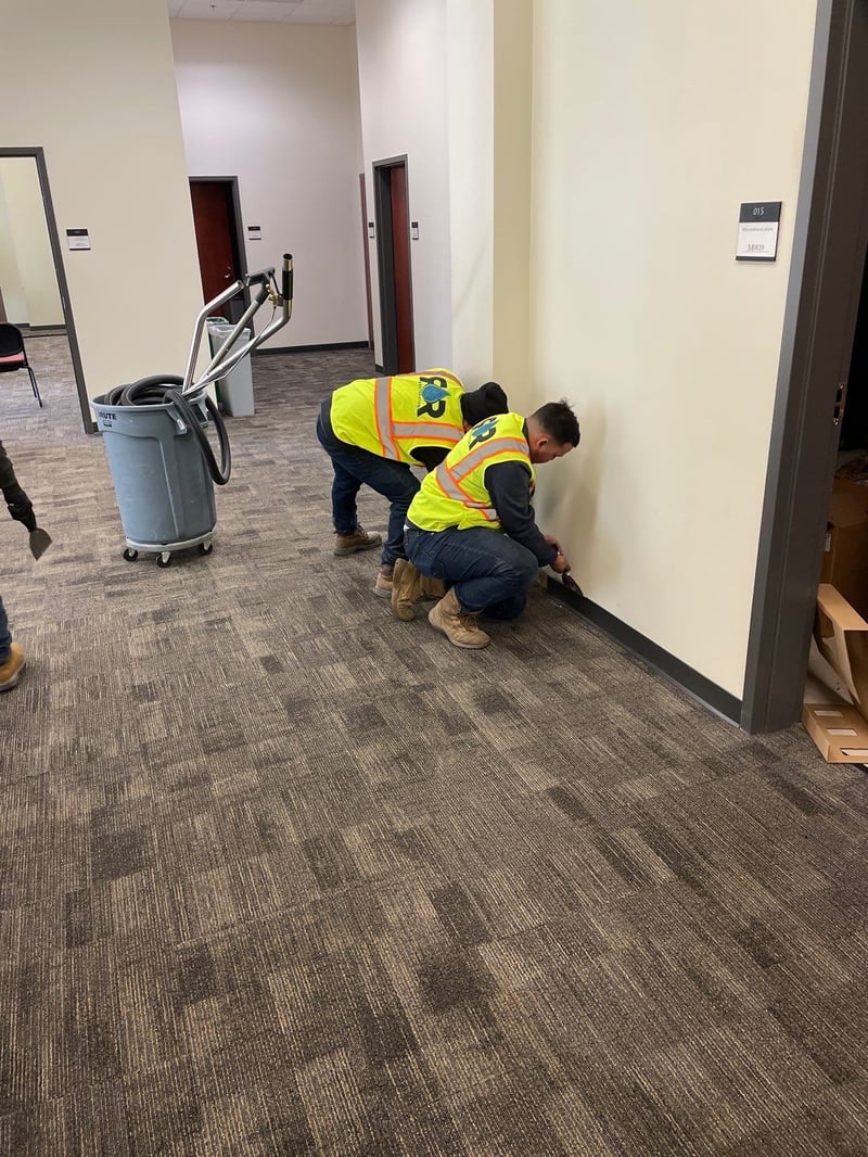 RR Restoration crew working on baseboard