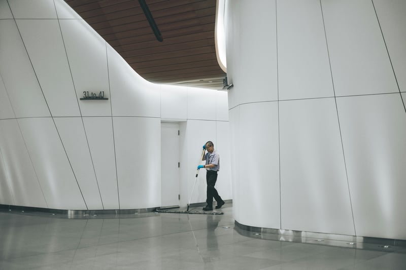 Professional building maintenance team at work in a modern facility