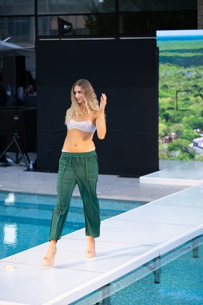 Swim Model Poses in Green Resort Trousers