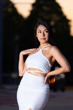 jules-4-white-tank-skirt-looking-left.jpg
