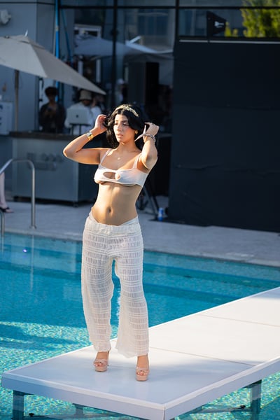 Ellen Hunter x Vauras Sheer White Beach Trousers Poses