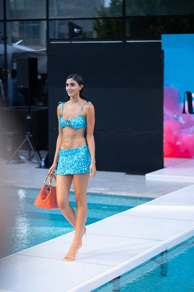 Swim Model Poses in Metallic Cutout One-Piece