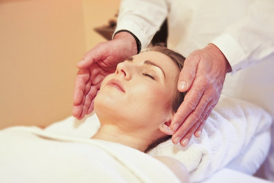 An image of a person doing Reiki