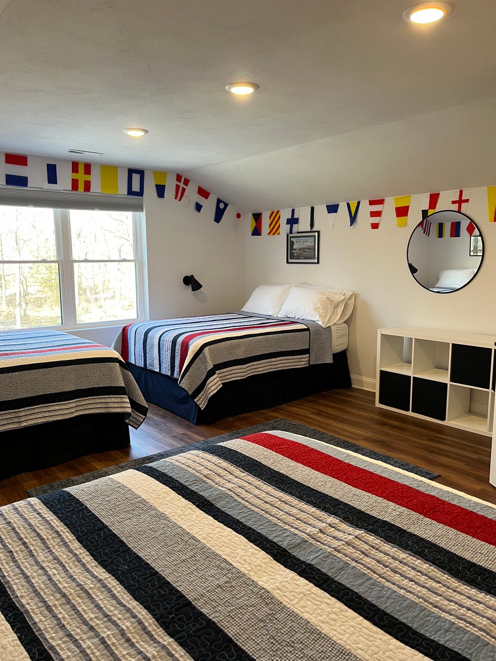 Bedroom 5 bunk room featuring three full size beds