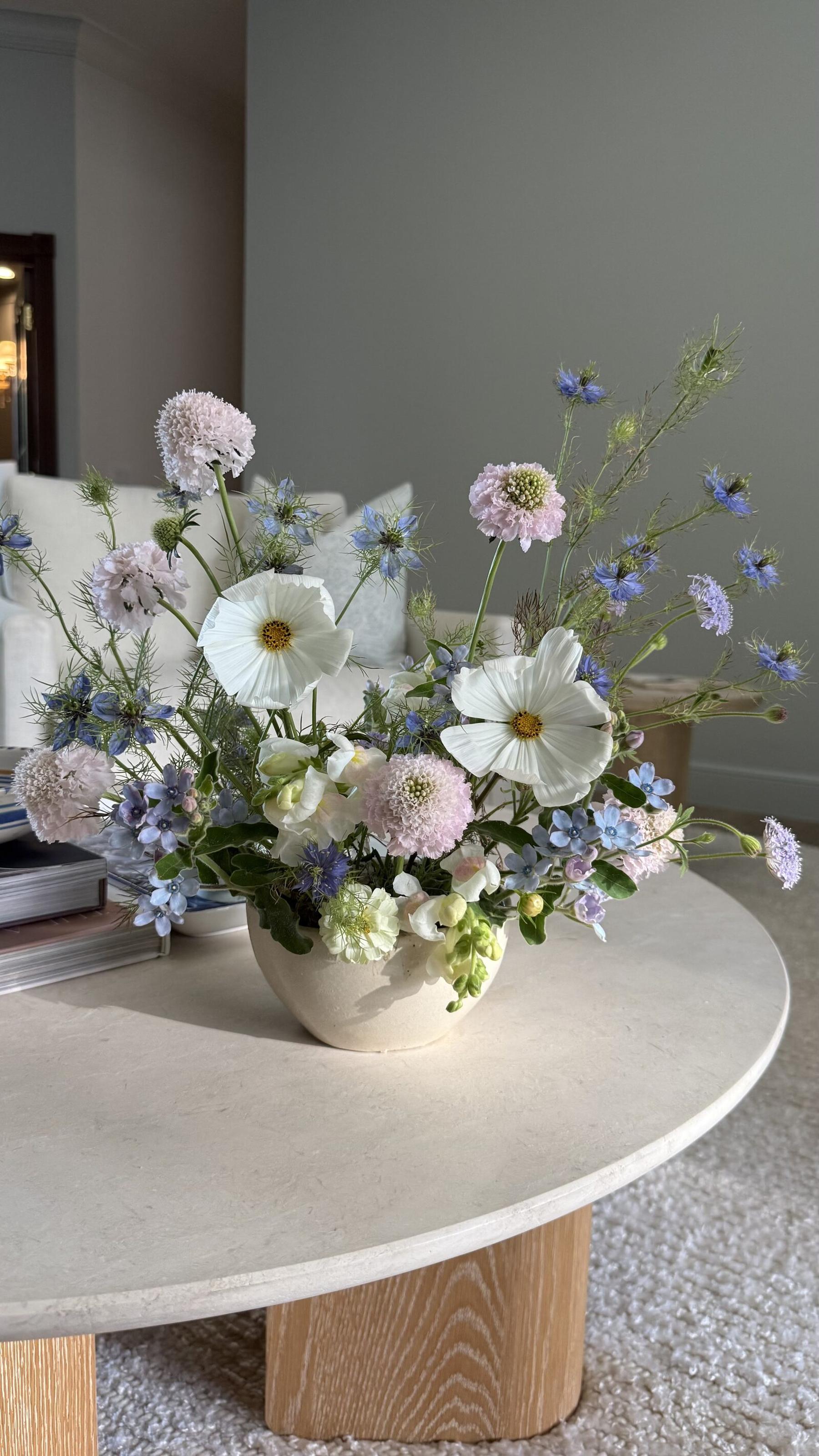 Pastel spring arrangement with scabiosa, cosmos, and nigella