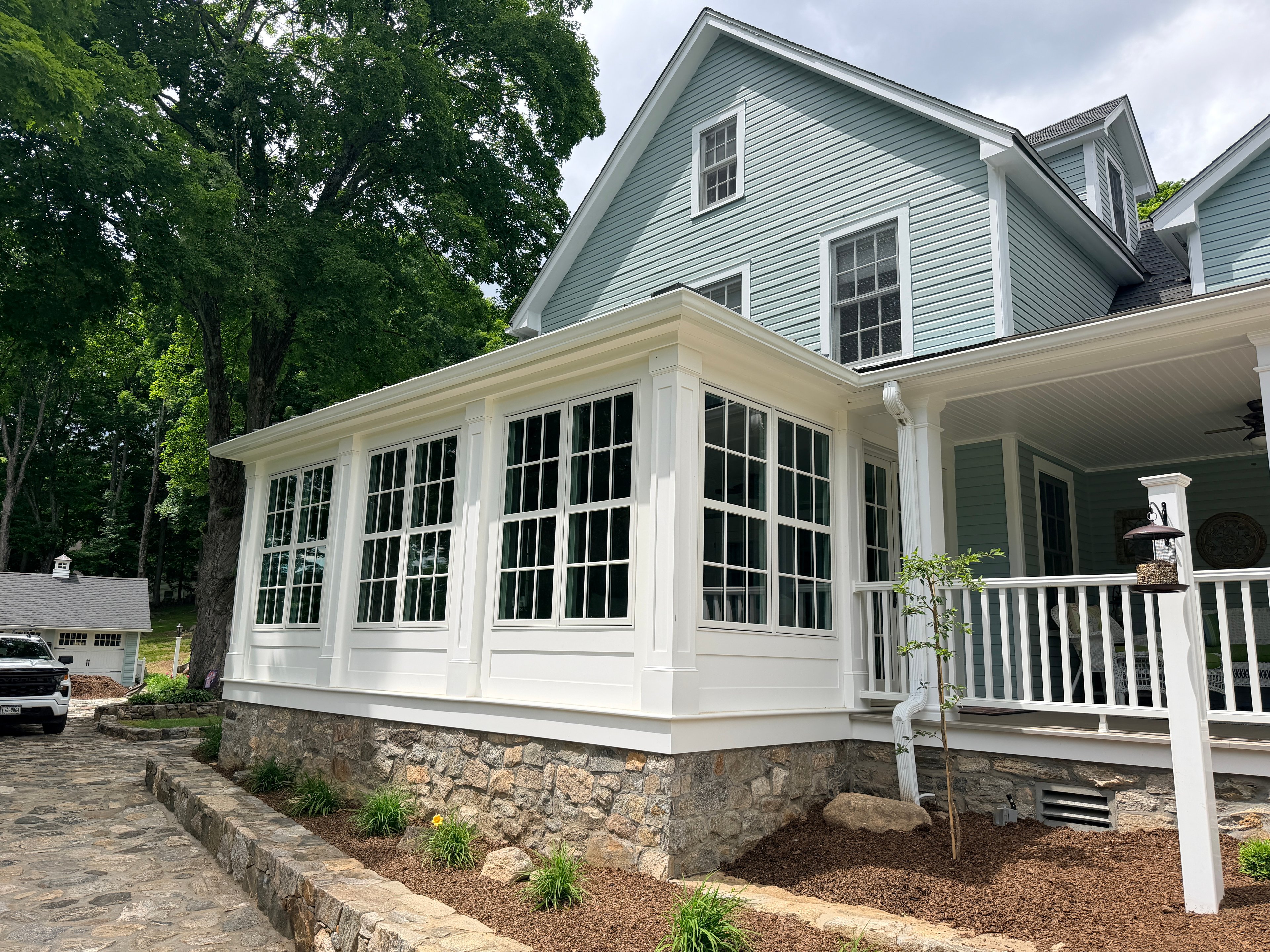 Somers sunroom — three-wall Marvin Elevate window addition on historic farmhouse